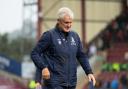 Mark Hughes looks disconsolate after more boos at  Valley Parade