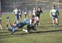 Liam Johnson crosses the line to score for the Bulls against West Wales Raiders – Picture: Tom Pearson
