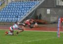Ethan Ryan beats his man to score Bulls' second try against Hunslet   Picture: Tom Pearson