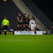 Jack Payne hammers his free-kick past the City wall for the second goal
