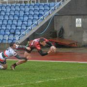 Ethan Ryan beats his man to score Bulls' second try against Hunslet   Picture: Tom Pearson