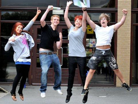Jumping for joy are Guiseley School students, from the left, Beth Hey (three As), Tom Connolly (four As), Katie Wood (three As) and Rory Sands (four As).