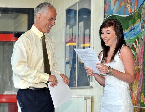 Bingley Grammar School student Joanne Butterworth receives her results from head teacher Chris Taylor.