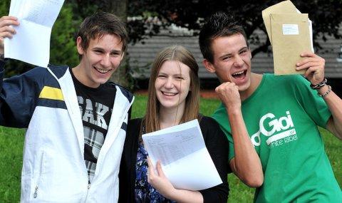 Celebrating their results are Horsforth School students, from the left, Oliver Viles, Sophie Breton and Tom White.