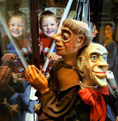Six-year-old Joseph Hutton is all smiles as he views puppets on display at the Craven Museum in Skipton. 