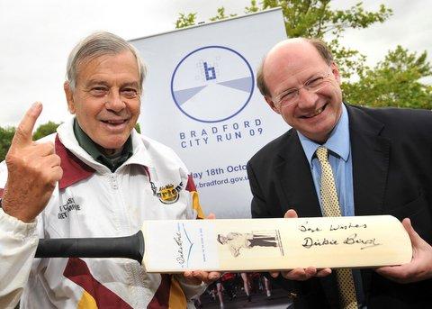 A cricket bat signed by legendary umpire Dickie Bird is one of the prizes being awarded to participants in the Bradford City Run. 