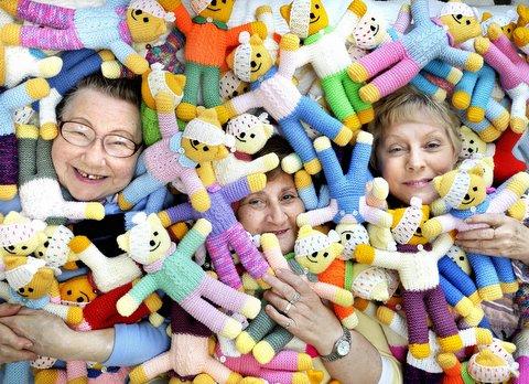 Three friends have got together to knit hundreds of bears for the BBC Children in Need appeal as the annual fundraiser approaches. 