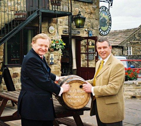 Head brewer at Keighley's Old Bear Brewery Ian Cowling (right) got a special wooden barrel of beer for his 50th birthday - presented to him by Theakston's brewery boss Simon Theakston (left).