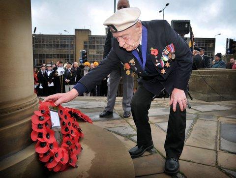 James Brewer lays a wreath during the Remembrance Day Parade in Bradford city centre.
