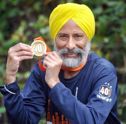 A long distance runner has returned home with his 62nd medal after completing the New York Marathon for a third time. Joginder Singh, 56, of East Bowling, has taken part in more than 60 marathons and half-marathons during the past 16 years. 