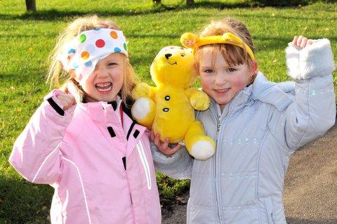 Guiseley Infant School pupils walked around the school perimeter to raise funds. Emily Harrison and Eleanor Biggs, both 4, took their Pudsey Bear along.