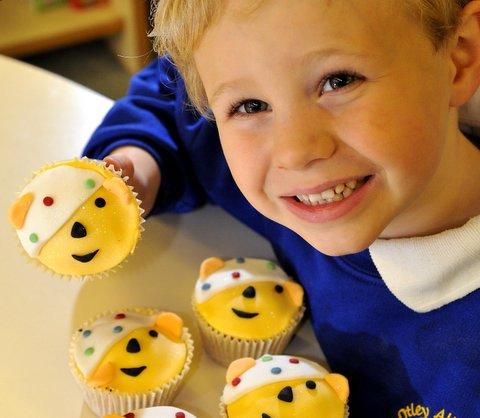 All Saints School, Otley pupils baked buns for sale. Elliot Hook, 5, is pictured with his Pudsey Bear buns.
