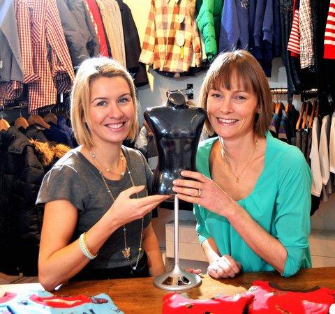 Shop owners Caroline Spellman and Rebecca Clark proudly show off their prestigious elite fashion industry award after being voted the Kidswear Retailer of the Year at an awards ceremony in London.
