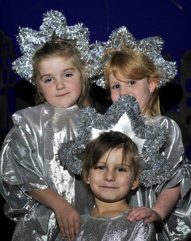 Taking part in Woodside Primary School Christmas production were, clockwide from the middle, Georgina Nash, Lucy Hall and Abby Muschamp.