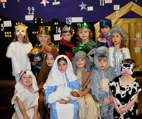 Some of the cast of Ilkley  Sacred Heart RC Primary School Nativity 'The Bossy King' with Isobel Smith as Mary and Jacob Coverdale as Joseph.