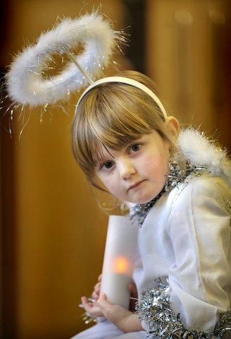 Lara Clarke-Benson plays an angel in The cast of Foxhill Primary School Nativity.