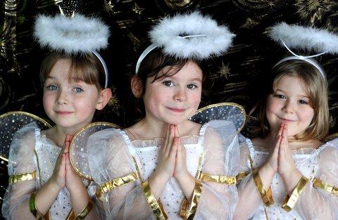 Playing angels in Swain House Primary School Nativity were, from the left, Megan Gudgeon, Daisy Longbottom, and Chloe Adams.