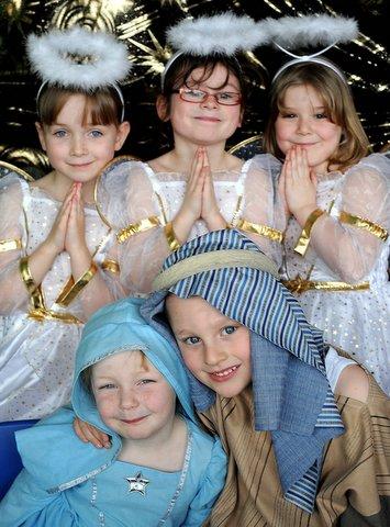 Appearing in Swain House Primary School Nativity were angels, from the left, Megan Gudgeon, Daisy Longbottom and Chloe Adams, Mary, Liberty Wells and Joseph, Jack Hollings.