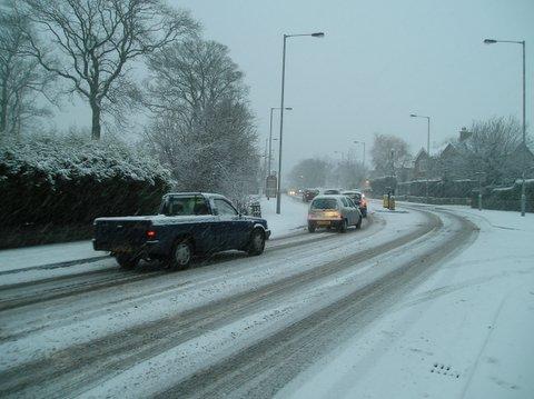 Cars skidding along Cleckheaton Road, Bradford.