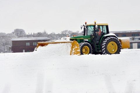 Snow ploughs battle to clear the runway at Leeds-Bradford International Airport.