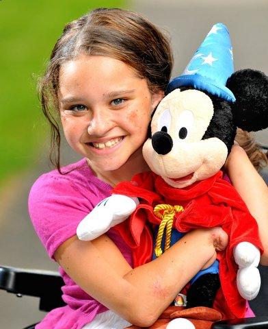 Danielle Skilbeck, 11, of Otley, who won a Children of Courage award in 2004 after contracting meningitis, is back from a Dreamflight charity holiday, where she fulfilled her ambition of swimming with dolphins in Orlando, Florida.