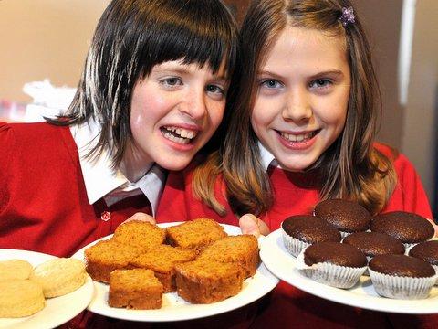 All Saints C of E Primary School, Ilkley, pupils Amy Hale and Katie McNamara have been selling buns in school to raise money for relief efforts in Haiti, one of many fundraising events for the earthquake victims. 

