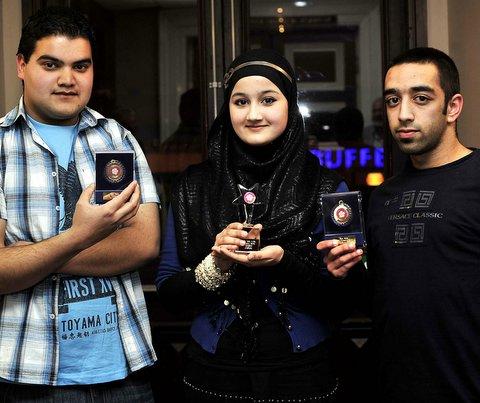 Stay Safe Award 12-25 winner Sabah Afzal with fellow nominees Tahir Shah, left, and Hafees Hussain.