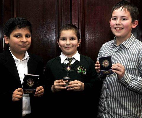 Under-11 Enjoy and Achieve Award winner Kristian Nemet with fellow nominees Mihir Joshi, left, and Lewis Hartley.