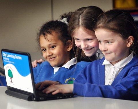 Children got their hands on some hi-tech classroom kit to develop writing skills. 
Thirty pupils at Shirley Manor Primary School, Wyke, were yesterday kitted out with netbooks – mini laptops – thanks to Challenge City Learning Centre in Bradford. 