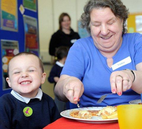 A group of parents have set an example for children at school meal times. 
Once a week, six parents have joined their reception children for lunch at Ley Top Primary School, Allerton, as part of the Talking Tables project. 