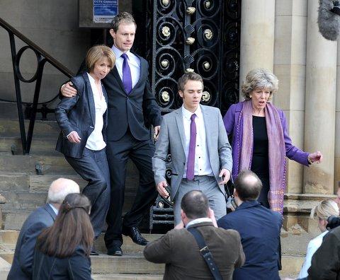 Gail McIntyre (Helen Worth) emerges from court with sons Nick Tilsley (Ben Price), David Platt (Jack P Shepherd) and Audrey Roberts (Sue Nicholls), implying she's been found not guilty.