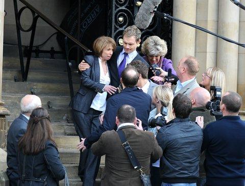 Gail McIntyre (Helen Worth) emerges from court with son Nick Tilsley (Ben Price) and Audrey Roberts (Sue Nicholls).