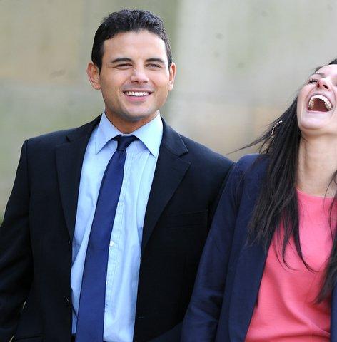 Jason Grimshaw (Ryan Thomas) and Tina McIntyre (Michelle Keegan) share a joke outside City Hall.