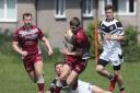 Live-action from the game between Wibsey Warriors (maroon) and Stanningley (white). Picture: Alex Daniel Photography. 