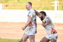 A delighted Kieran Gill celebrates with Keven Appo, after the former's late try sealed an 1895 Cup quarter-final victory over Swinton in Bulls' last game.