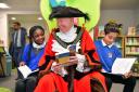 Lord Mayor of Bradford Gerry Barker helps to open the new library