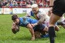 Aidan McGowan gets the better of Junior Sa'u to score in Bulls' gripping 26-18 win at Keighley last month, which sealed the visitors' spot in the knockout stages of the AB Sundecks 1895 Cup.