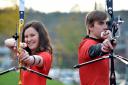TAKING AIM:  Freya Leask and Dean Dowling, of the University of Bradford's Archery Club, are taking part in a non-stop 24-hour shoot-out for the Telegraph & Argus Crocus Cancer Appeal