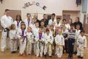 The TSX Taekwondo squad at St Cuthbert's Church in Wrose, with instructor David Fairley on the far left