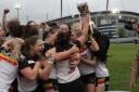 Bradford Bulls players celebrate winning the first ever Women's Super League Grand Final, beating Featherstone Rovers 36-6 at Manchester Regional Arena Picture: Simon Hall