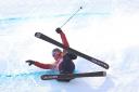 Tyler Harding takes a tumble during qualifying in the men's freestyle slopestyle – Picture: Mike Egerton/PA Wire