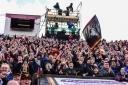Bradford Bulls fans celebrate at Odsal Stadium after the side's heroic Challenge Cup victory against Super League Leeds Rhinos in May. Picture: Tom Pearson.