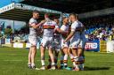 Bulls celebrate a try in their defeat to Featherstone Rovers in the Betfred Championship in May. Picture: Tom Pearson 