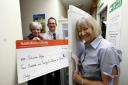 Keighley Salvation Army development manager Chris Bown shows off the new freezer with Sainsbury’s Keighley manager Paul Coulson and PR ambassador Julie Shaws