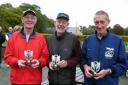 Over-70s relay winners George Buckley, Fred Gibbs and Pete Covey of Bingley show off their trophies