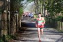 Ilkley Harriers’ Thomas Adams breaks clear of the pack in the Baildon Boundary Way