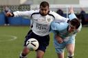 Interest is building again in former Bradford Cityy youth player Inderjeet Aujla, left, seen in action for Guiseley Reserves