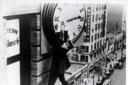 Silent comedian Harold Lloyd in one of his death defying hilarious stunts