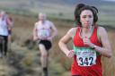 Ilkley Harriers' Sally Morley on her way to fifth place in the Auld Lang Syne Fell Race. Credit: Dave Woodhead