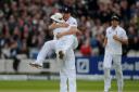 Jonny Bairstow celebrates running out Kirk Edwards in the first Investec Test at Lord's